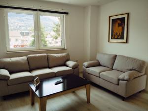 Uma área de estar em Apartmani Bujrum