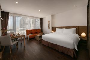 Postel nebo postele na pokoji v ubytování The Bloom Pham Viet Chanh - Modern Living Space in Saigon - A Top Choice for Western Travelers