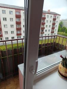 En balkon eller terrasse på Margo-Apartament