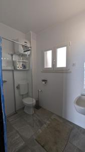 Koupelna v ubytování Paradies Apartments Prizba