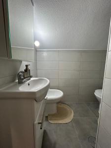 Koupelna v ubytování A casa da Tia Júlia
