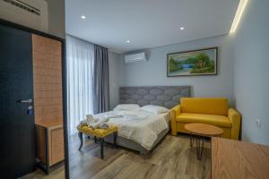 Postel nebo postele na pokoji v ubytování Sunkised Hotel