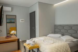 Postel nebo postele na pokoji v ubytování Sunkised Hotel