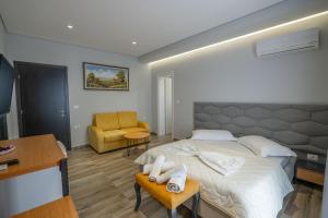 Postel nebo postele na pokoji v ubytování Sunkised Hotel