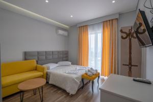 Postel nebo postele na pokoji v ubytování Sunkised Hotel