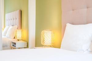 Ένα ή περισσότερα κρεβάτια σε δωμάτιο στο GuestReady - Modern and cosy apartment