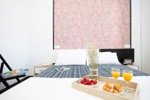 Posteľ alebo postele v izbe v ubytovaní GuestReady - Valencia's Cabanyal Confy Apartment