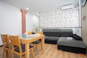 Posedenie v ubytovaní GuestReady - Valencia's Cabanyal Confy Apartment