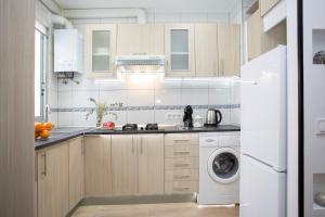 Kuchyňa alebo kuchynka v ubytovaní GuestReady - Valencia's Cabanyal Confy Apartment