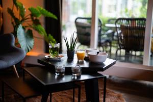 Posezení v ubytování Kruller - Hotel B&B + 29 fotografií
