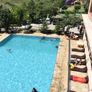 Bazén v ubytování Sunstar Resort Thika nebo v jeho okolí + 8 fotografií