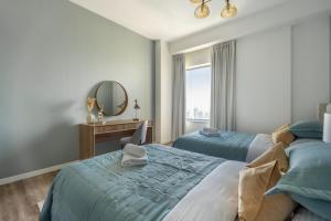 Postel nebo postele na pokoji v ubytování GuestReady - Modern and luxe near JBR Beach