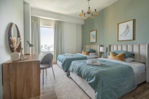 Postel nebo postele na pokoji v ubytování GuestReady - Modern and luxe near JBR Beach