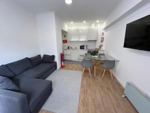 TV a/nebo společenská místnost v ubytování A casa da Tia Júlia