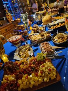 a buffet with many different types of food on a table at Nega Joana in Araruna