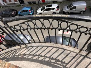an overhead view of a parking lot with parked cars at Chambre musicale in Brussels