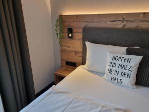 Postel nebo postele na pokoji v ubytování Hotelpark Stadtbrauerei Arnstadt