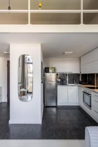 Kuchyňa alebo kuchynka v ubytovaní RentPlanet - Apartament Matejki