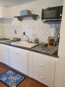 Cucina o angolo cottura di Casa Lavinia - open space con terrazza privata