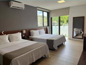 Katil atau katil-katil dalam bilik di Santíssimo Resort +48 gambar