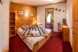 Postel nebo postele na pokoji v ubytování Le Chalet d'en Hô