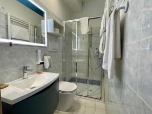 Koupelna v ubytování B City Hotel