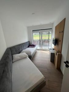 Postel nebo postele na pokoji v ubytování Penthouse Lorenzerhof