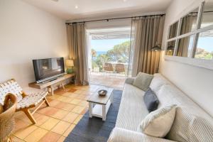 Posezení v ubytování Refurbished Apartment Seaview, Santa Agata