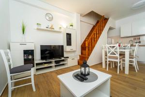 TV a/nebo společenská místnost v ubytování Holiday Home Mara