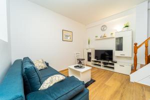 TV a/nebo společenská místnost v ubytování Holiday Home Mara