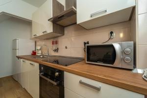 Kuchyň nebo kuchyňský kout v ubytování Holiday Home Mara