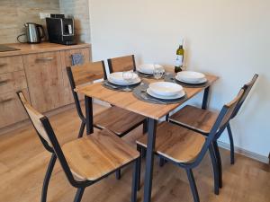 Kuchyň nebo kuchyňský kout v ubytování Apartmány Family Nová Lesná