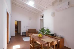 Χώρος καθιστικού στο Casa Lureca Ortigia Giudecca +12 φωτογραφίες