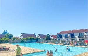 a group of people in a swimming pool at Beautiful Home In Bredene With Kitchen in Bredene