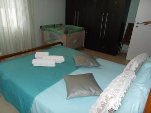 Postel nebo postele na pokoji v ubytování kaite house