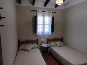 Posteľ alebo postele v izbe v ubytovaní Casa Villazo 1