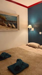 Una cama o camas en una habitación de Appart CANNES résidence piscine-parc-tennis