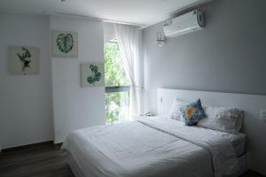 Postel nebo postele na pokoji v ubytování Camellia