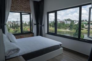 Postel nebo postele na pokoji v ubytování Camellia