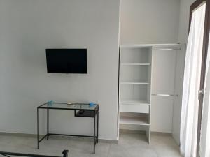 TV a/nebo společenská místnost v ubytování A Balata Apartments