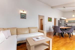 Kuchyň nebo kuchyňský kout v ubytování Apartments Gisela