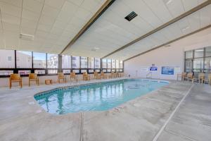 Bazén v ubytování Desert Sand Resort nebo v jeho okolí