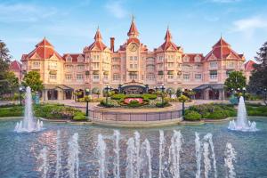 a large building with a fountain in front of it at Disneyland® Hotel in Chessy