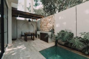 Galería fotográfica de Torana A1 Cozy Design APT w Pvt Pool and Patio en Tulum