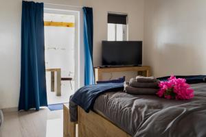 Postel nebo postele na pokoji v ubytování Dushi Vida Country Inn + 21 fotografií