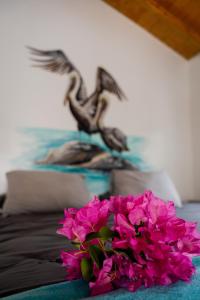 Postel nebo postele na pokoji v ubytování Dushi Vida Country Inn