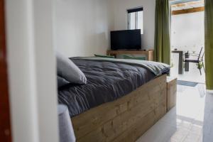 TV a/nebo společenská místnost v ubytování Dushi Vida Country Inn
