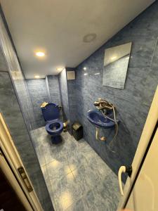 Koupelna v ubytování DINEVI APARTMENTS