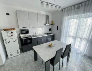 Kuchyň nebo kuchyňský kout v ubytování Apulian Apartment