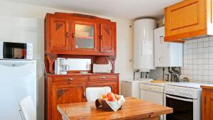 Kuchyň nebo kuchyňský kout v ubytování Gites de france 4 personnes au fau de peyre